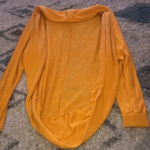 A yellow cardigan
